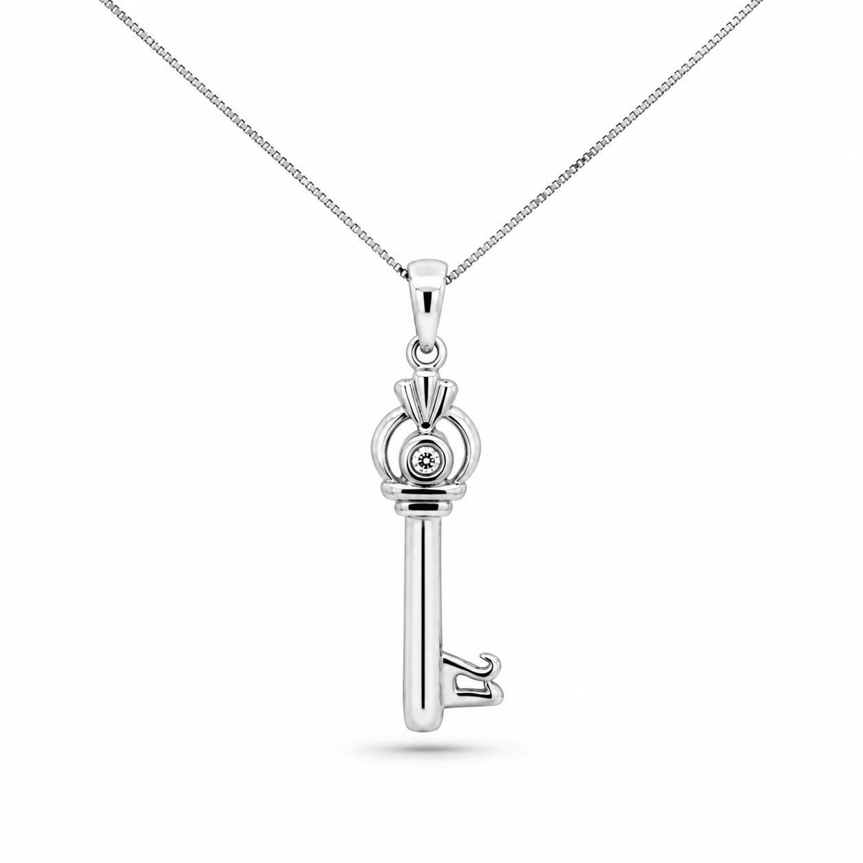 Elegant 10K white gold key pendant necklace featuring 0.86 CTW natural diamonds.