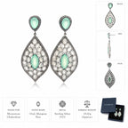 Product specification image of luxury Aqua Chalcedony and Moonstone statement drop earrings in sterling silver with front, side and back views, gemstone details and weight information by LA Noosha Jewelry.