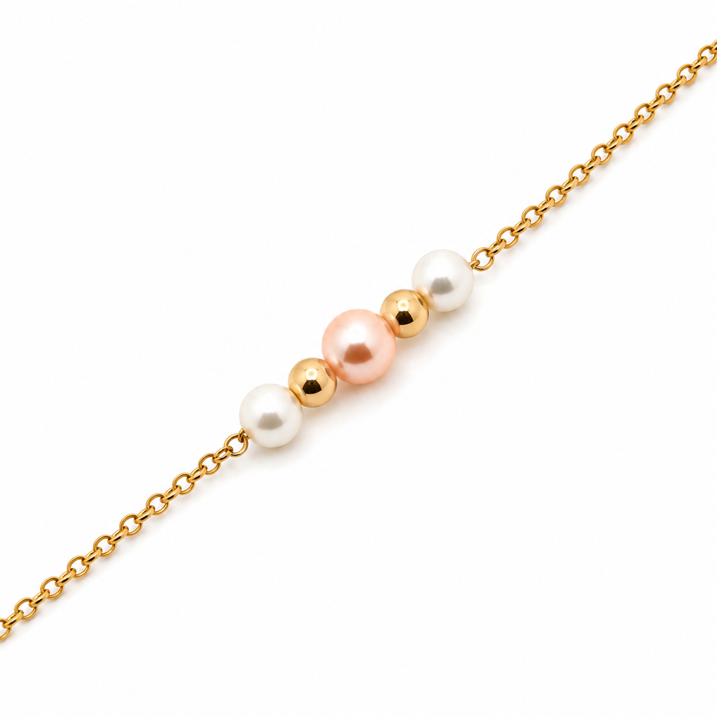 14K gold freshwater pearl bracelet with white and blush pearls on a fine station chain