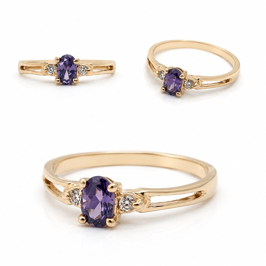 Elegant 14K gold ring featuring an oval-cut amethyst center stone with sparkling diamond accents