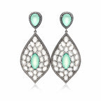 Luxury sterling silver statement drop earrings featuring Aqua Chalcedony center stones, Moonstone accents, and sparkling cubic zirconia details.