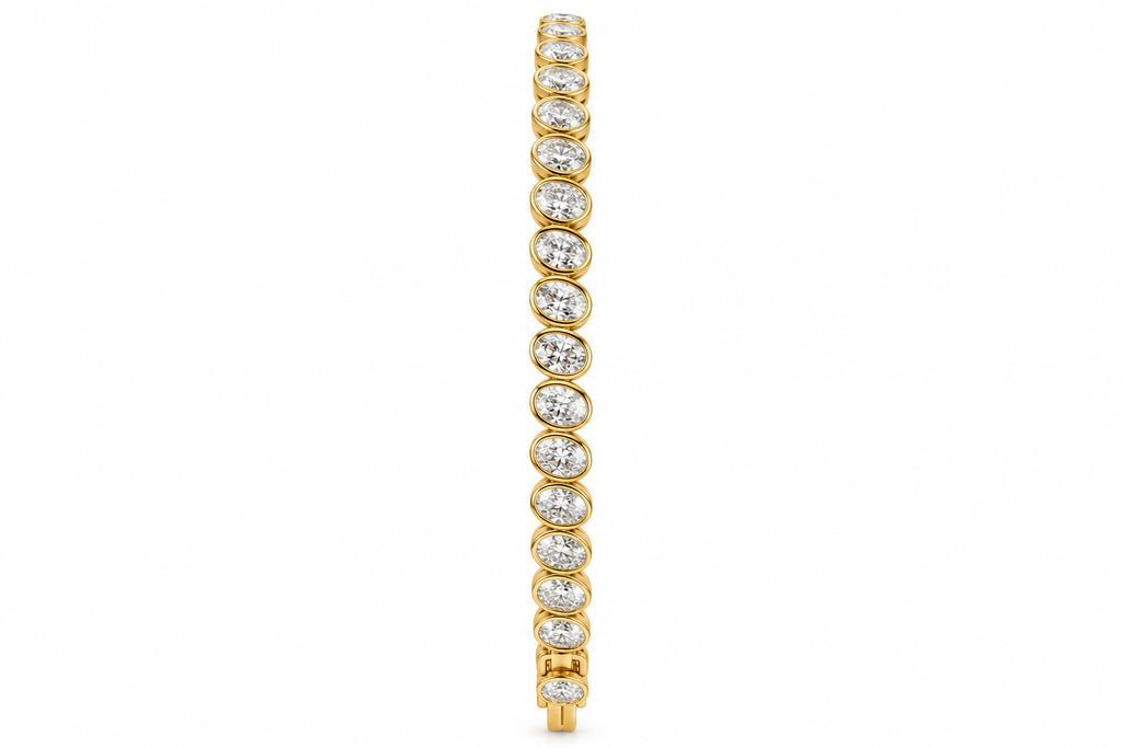 Oval Cut Lab-Grown Diamond Tennis Bracelet in Yellow Gold with Bezel Set Diamonds – La Noosha Jewelry