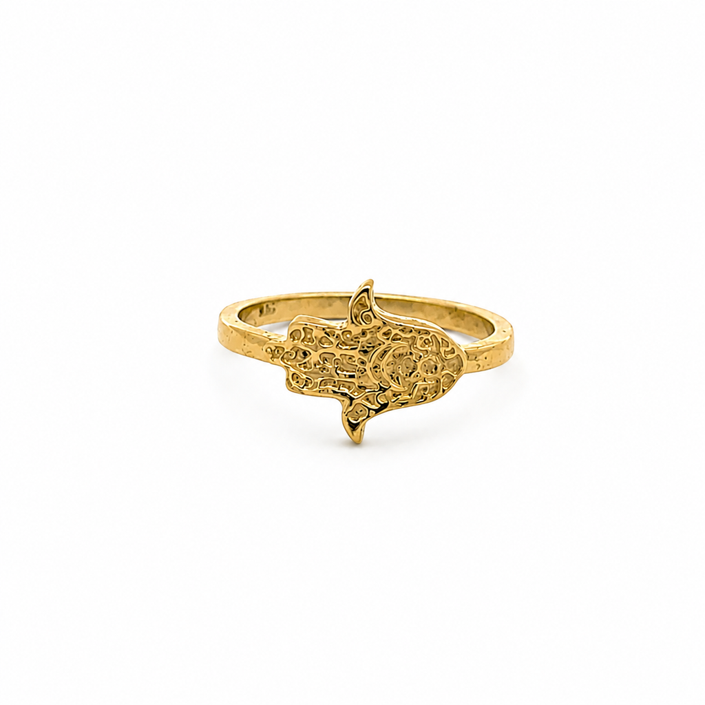 18K gold Hamsa hand ring with intricate filigree design on white background