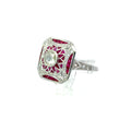 Luxury 18K Art Deco ruby and diamond ring with geometric vintage design on white background