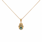 14K gold Hamsa hand necklace with blue evil eye pendant on a delicate gold chain displayed on a white background