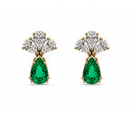 Natural emerald and diamond drop earrings in 18K gold on white background