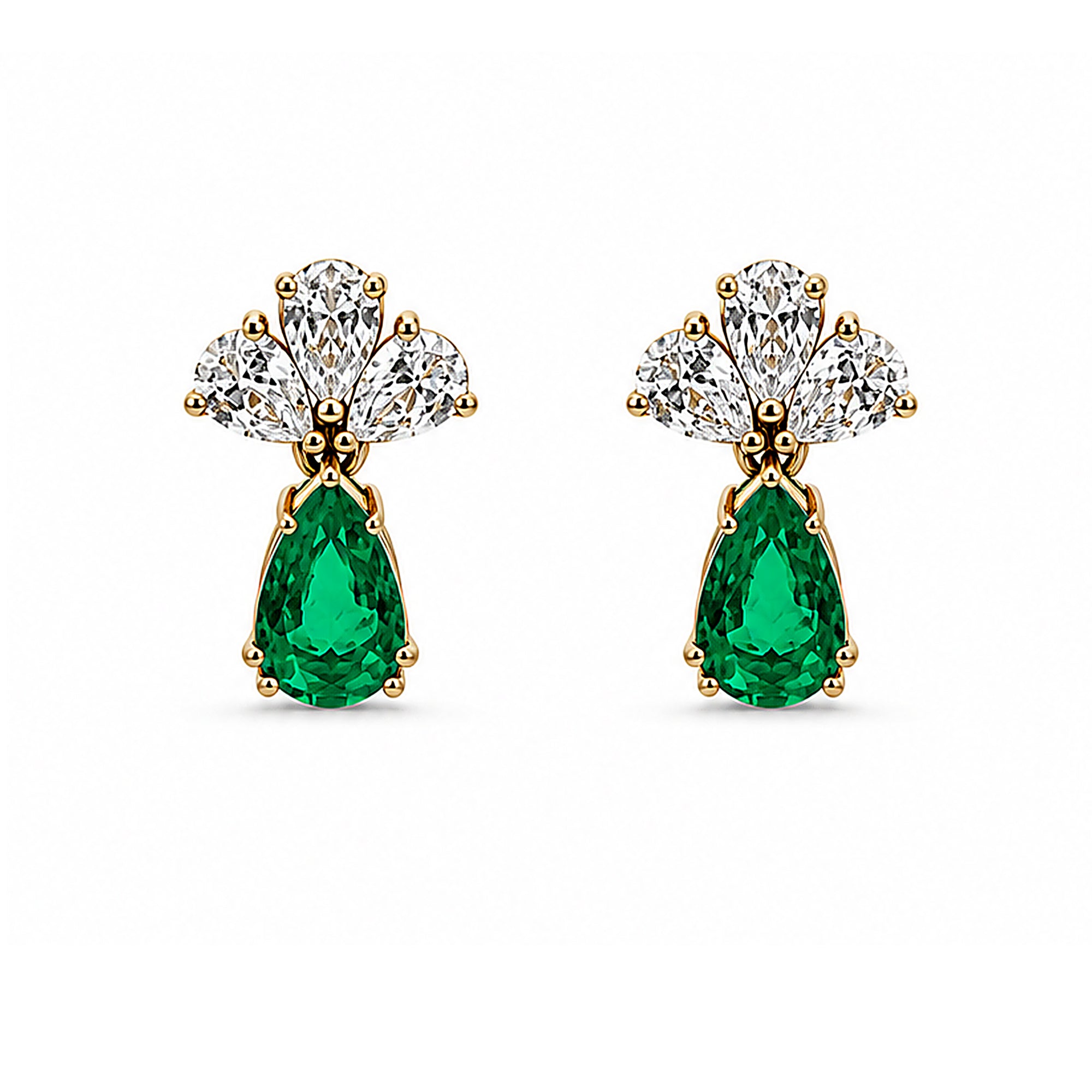 Natural emerald and diamond drop earrings in 18K gold on white background