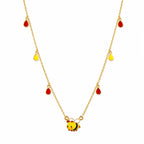 Kids gold necklace with a colorful bee and red and yellow teardrop charms