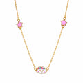 Kids gold necklace with two pink stars and a smiling white cloud centerpiece on a white background