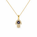 14K yellow gold Hamsa evil eye necklace featuring blue enamel and sparkling CZ stones on a delicate gold chain