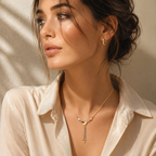 Woman wearing a 14K tri-color gold tassel necklace with yellow, white and rose gold details