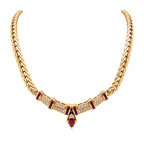 14K gold ruby and diamond necklace featuring natural ruby gemstones and sparkling diamond accents in an elegant statement design