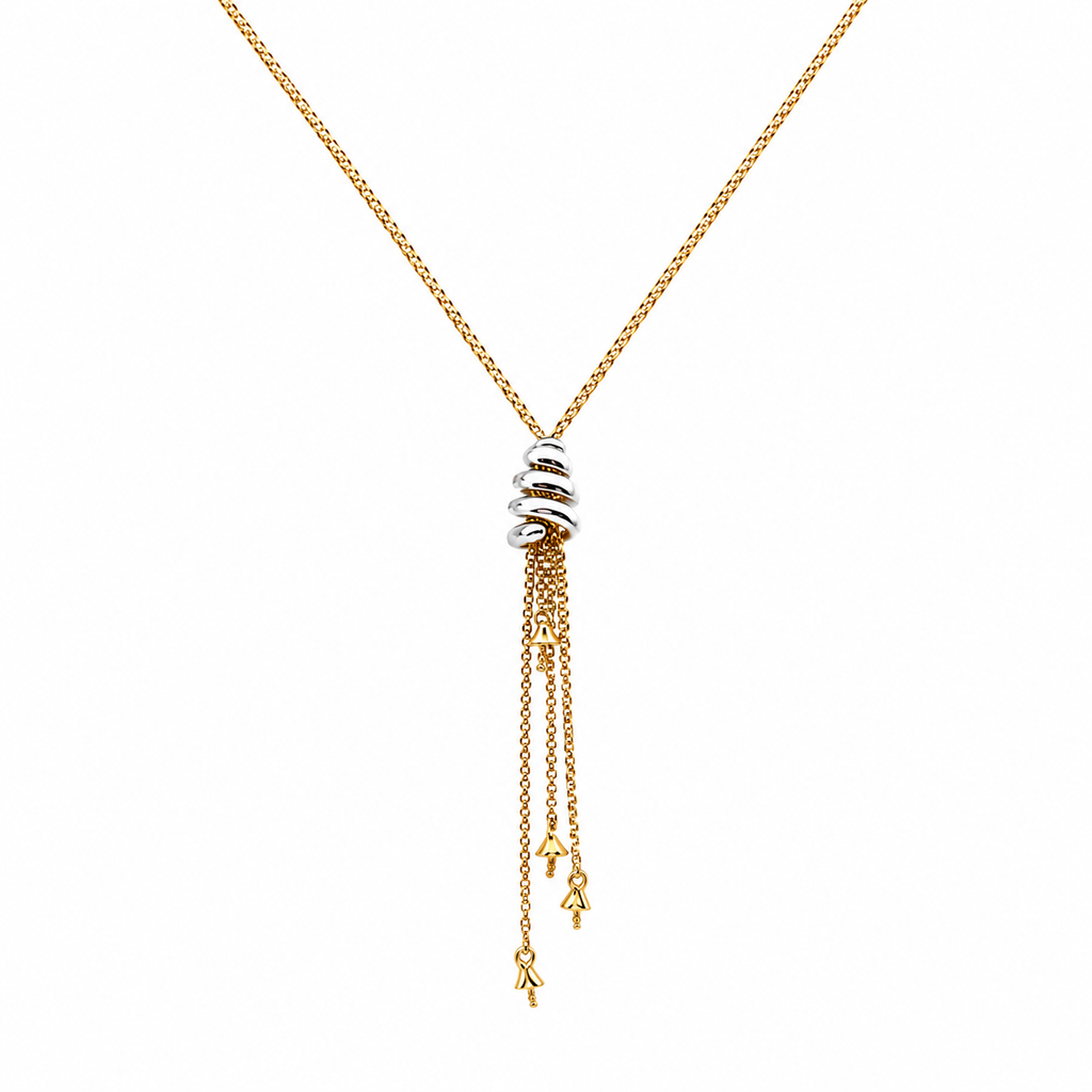14K two-tone gold tassel necklace featuring yellow gold chain and white gold centerpiece with dangling tassel details