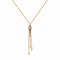 14K two-tone gold tassel necklace featuring yellow gold chain and white gold centerpiece with dangling tassel details