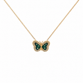 14K gold butterfly necklace with green enamel wings and CZ stone accents on a delicate gold chain