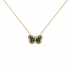 14K gold butterfly necklace with green enamel wings and CZ stone accents on a delicate gold chain